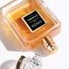 Chanel Coco Parfum – spoj ruže, vanile i ambera u savršenoj harmoniji. Poklopac parfema