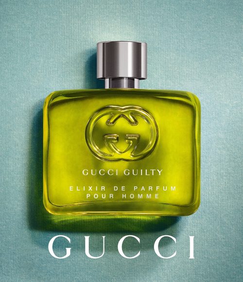 Detalj bočice Gucci Guilty Elixir sa sofisticiranim linijama i ime brenda belim slovima