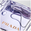 Prada Amber Pour Homme EDT muski parfem toptaurus.rs 2 Alt: Mirisne note Prada Amber Pour Homme EDT – bergamot, neroli, amber, sandalovina i vetiver, detalj bocice sa ljubicastim parfemom Prada