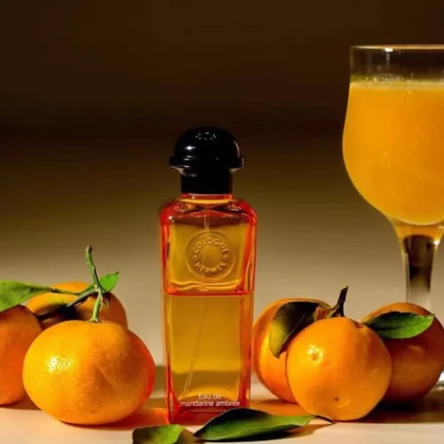 Hermès citrusni parfem sa notom mandarine ambjentalna slika