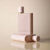 Burberry Her Elixir EDP zenski parfem toptaurus.rs 1 Burberry Her Elixir ženski parfem slika sa dve bovcice na puder pozadini